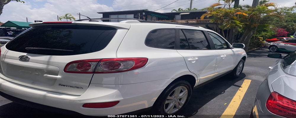 5NMSH4AG9AH340334 2010 HYUNDAI SANTA FE photo no. 4