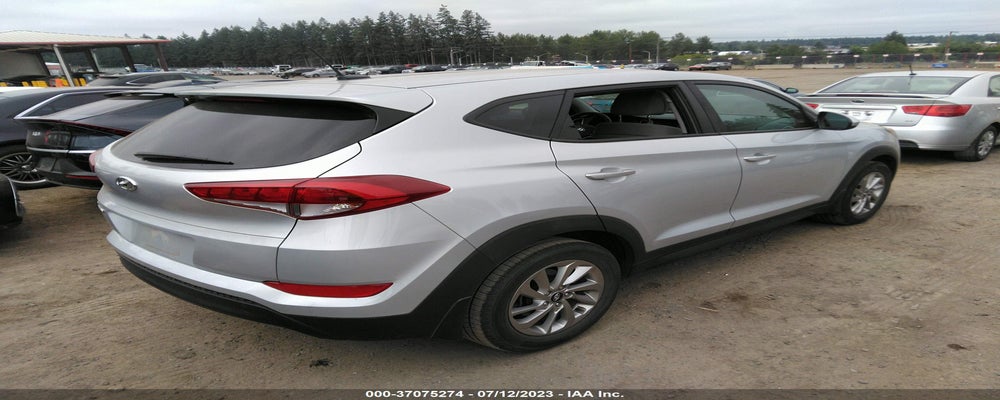 KM8J23A47HU424180 2017 HYUNDAI TUCSON photo no. 4