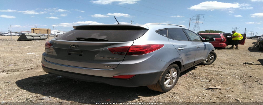 KM8JUCAC4DU663178 2013 HYUNDAI TUCSON photo no. 4