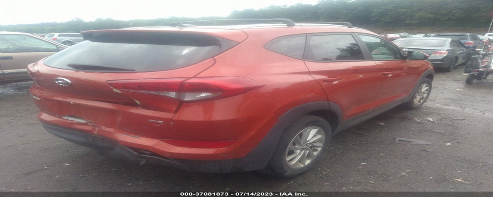 KM8J3CA42GU206529 2016 HYUNDAI TUCSON photo no. 4