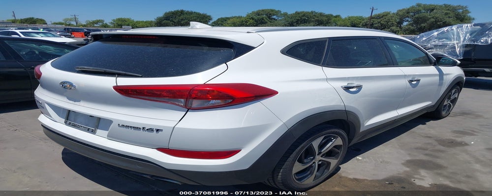 KM8J33A25GU036634 2016 HYUNDAI TUCSON photo no. 4