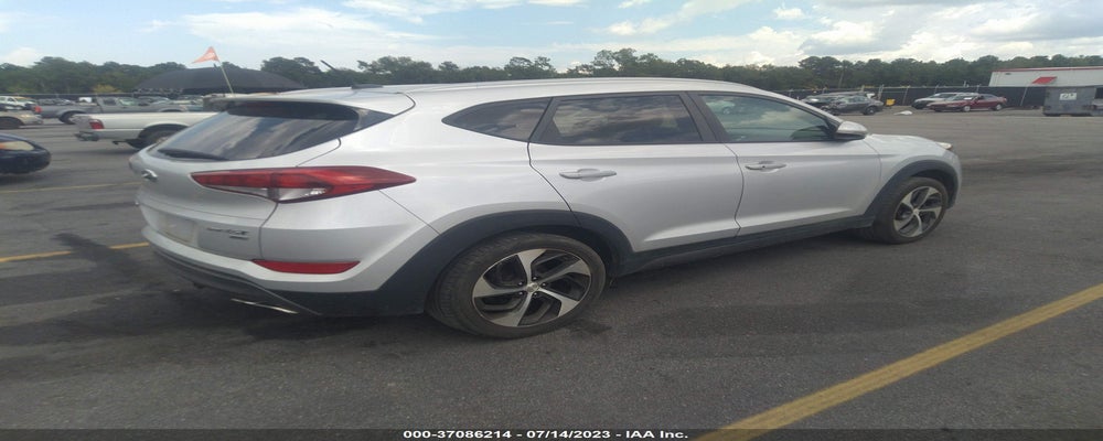 KM8J3CA25GU081184 2016 HYUNDAI TUCSON photo no. 4