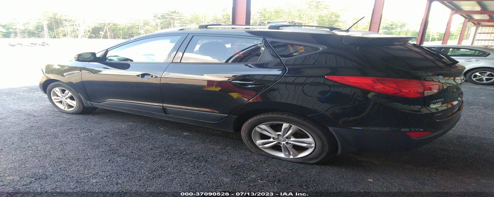 KM8JUCAC5DU694813 2013 HYUNDAI TUCSON photo no. 3