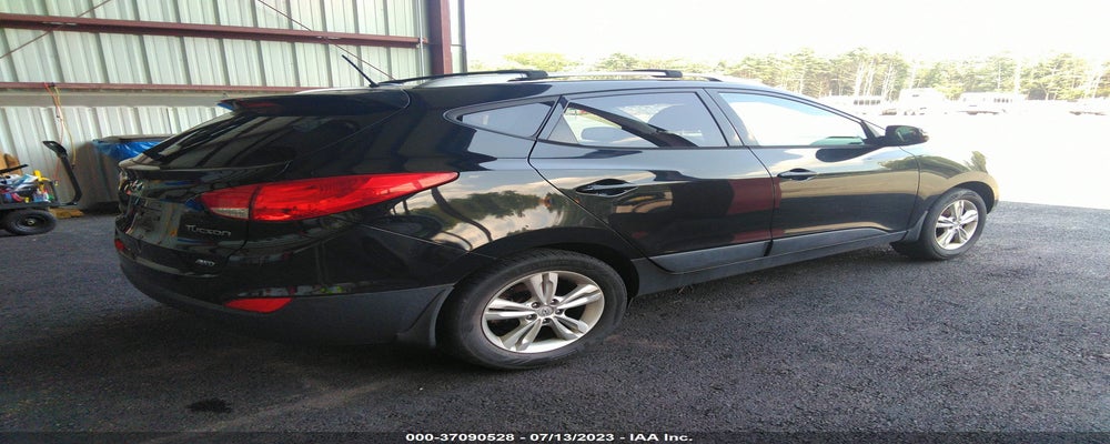 KM8JUCAC5DU694813 2013 HYUNDAI TUCSON photo no. 4