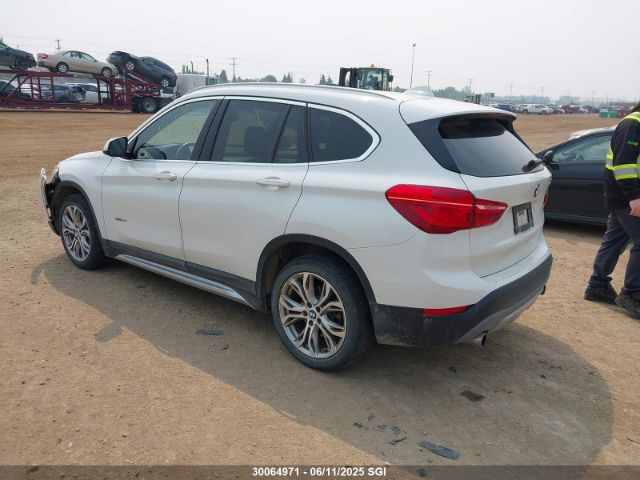 WBXHT3C35J5K30609 BMW X1 Xdrive28i