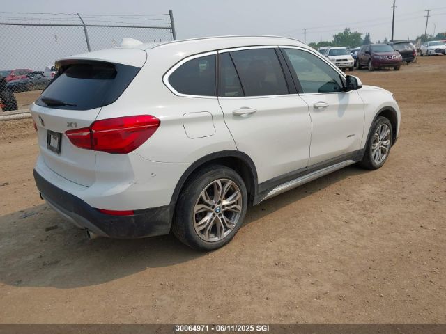 WBXHT3C35J5K30609 BMW X1 Xdrive28i