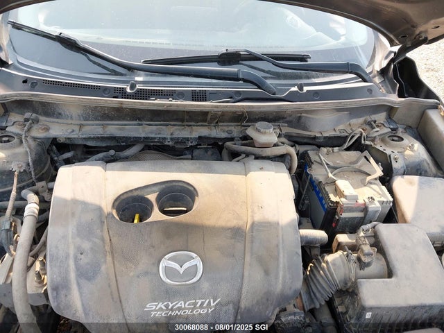 JM1DKFB77G0136497 Mazda pe