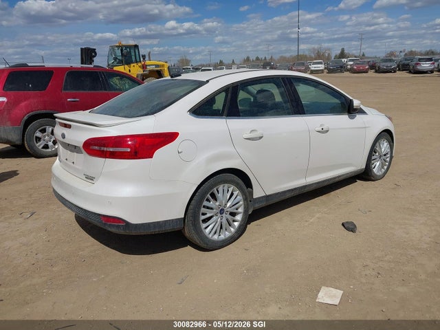 Продажа на аукционе авто 2015 Ford Focus Titanium, vin: 1FADP3J25FL320619, номер лота: 30082966