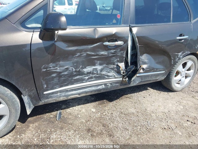 Продажа на аукционе авто 2009 Kia Rondo Lx/ex, vin: KNAFG528397262697, номер лота: 30090316