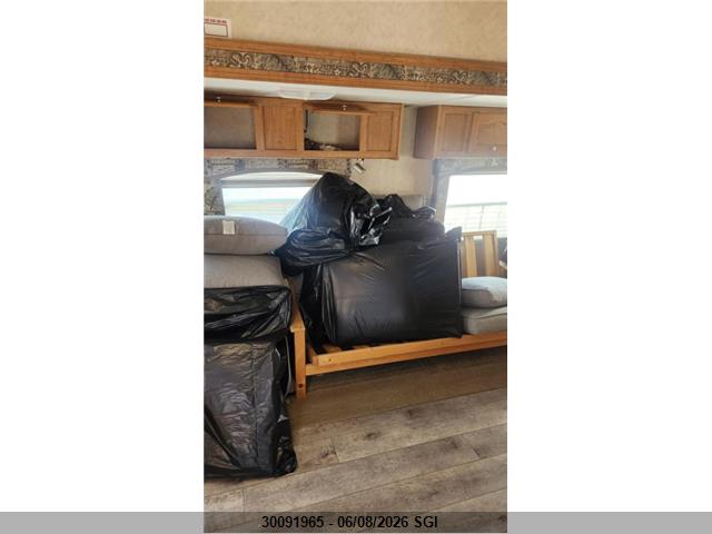30091965 :رقم المزاد ، 4X4FRLD246D809378 vin ، 2006 Forest River Inc. Rockwood Trailer 30ft مزاد بيع