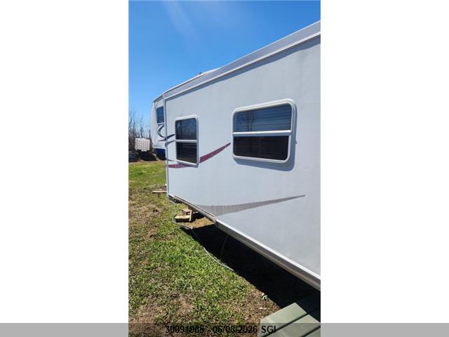 30091965 :رقم المزاد ، 4X4FRLD246D809378 vin ، 2006 Forest River Inc. Rockwood Trailer 30ft مزاد بيع