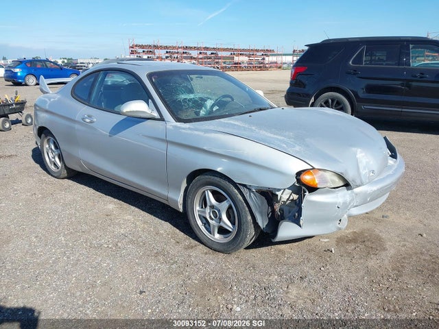 30093152 :رقم المزاد ، KMHJG34F3XU133771 vin ، 1999 Hyundai Tiburon Fx مزاد بيع