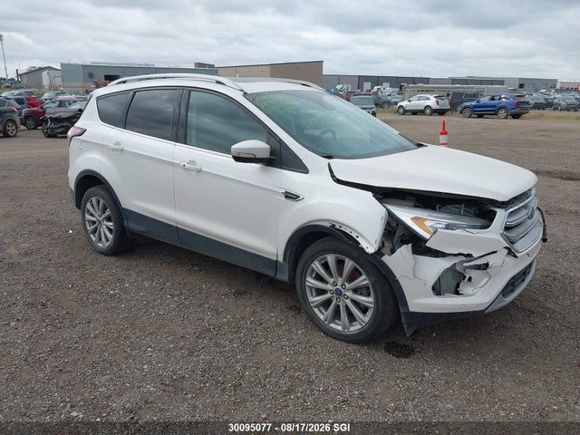Продаж на аукціоні авто 2017 Ford Escape Titanium, vin: 1FMCU9J92HUC57034, номер лоту: 30095077