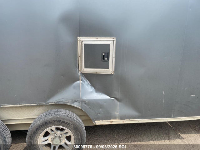 Alcom Holding Company Enclosed 2014 5WFBE1827EB002404 Image 8