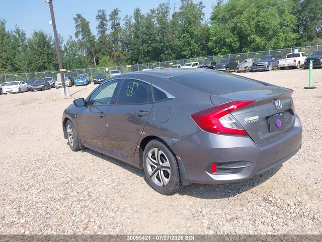 2HGFC2F57GH011052 Honda Civic Lx