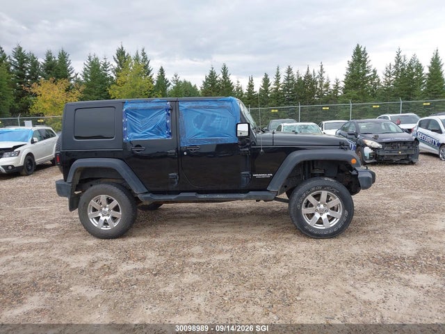 30098989 :رقم المزاد ، 1J4BA3H15AL198749 vin ، 2010 Jeep Wrangler Unlimited Sport مزاد بيع