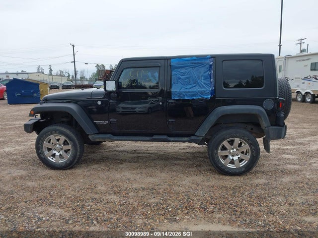 30098989 :رقم المزاد ، 1J4BA3H15AL198749 vin ، 2010 Jeep Wrangler Unlimited Sport مزاد بيع
