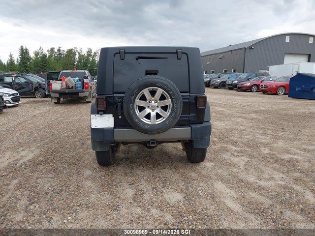 30098989 :رقم المزاد ، 1J4BA3H15AL198749 vin ، 2010 Jeep Wrangler Unlimited Sport مزاد بيع