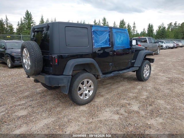30098989 :رقم المزاد ، 1J4BA3H15AL198749 vin ، 2010 Jeep Wrangler Unlimited Sport مزاد بيع
