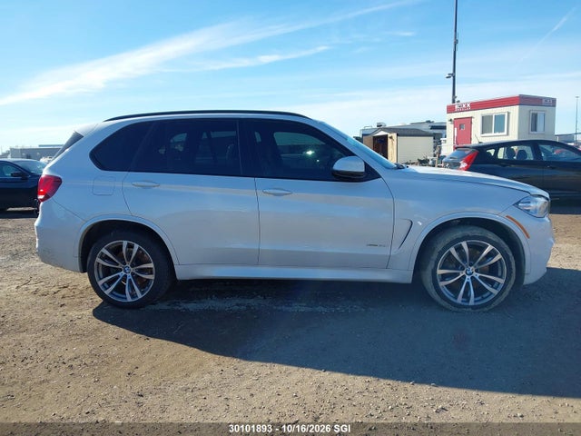 BMW X5 50i 2014 5UXKR6C55E0C03404 Image 12