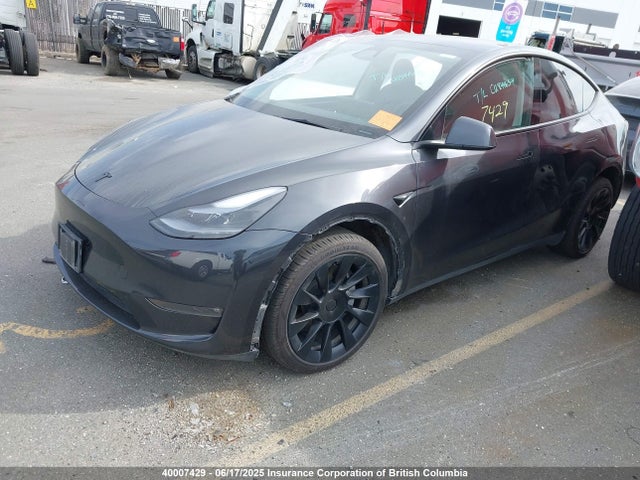 Tesla Model Y 2024 7SAYGDEE2RF989964 Image 2