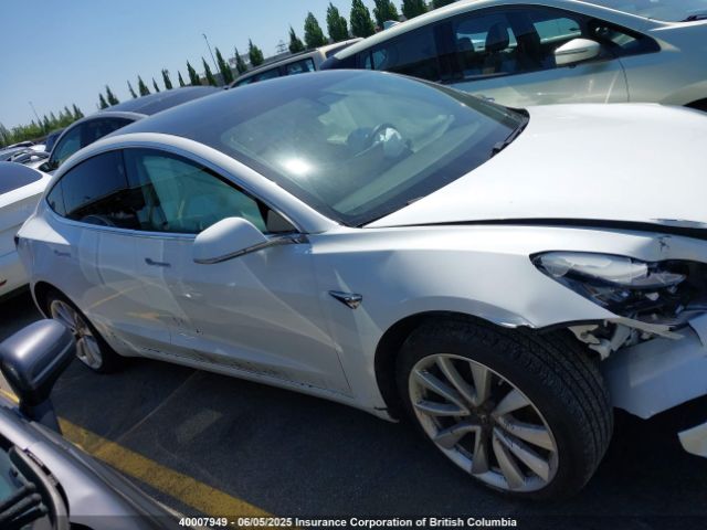 5YJ3E1EA3KF482182 Tesla 2019