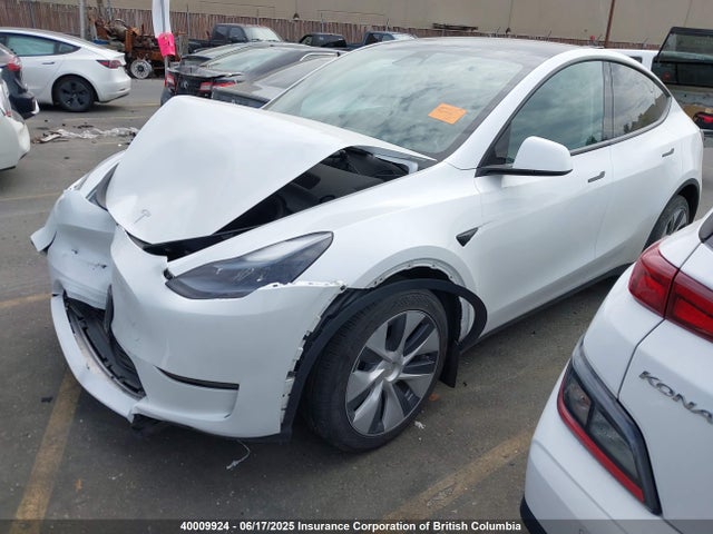 Tesla Model Y 2023 LRWYGDEE7PC079411 Image 2