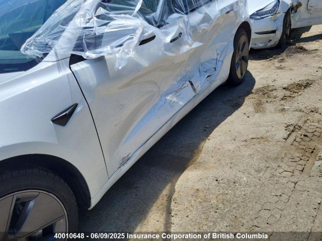 5YJ3E1EA5MF994593 Tesla 2021