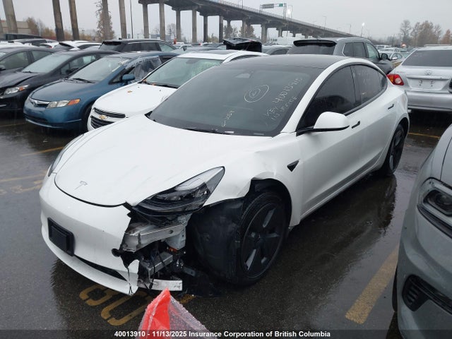 5YJ3E1EA0NF246416 Tesla 2022