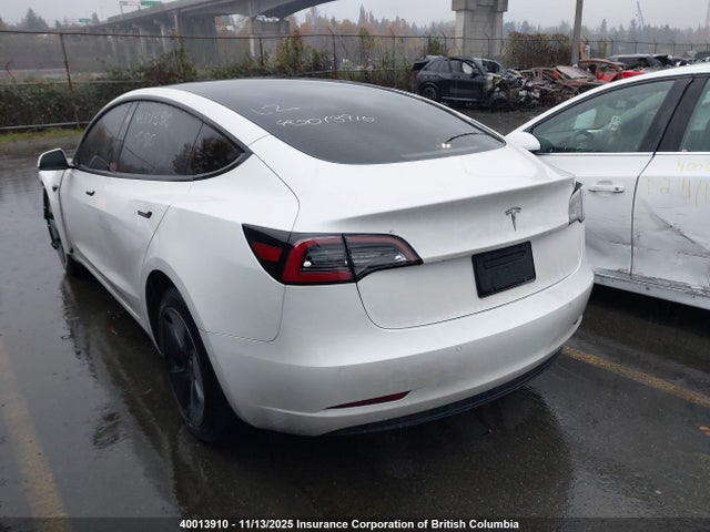 5YJ3E1EA0NF246416 Tesla 2022