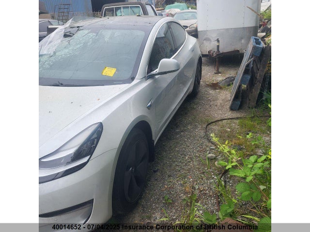 5YJ3E1EAXKF401310 Tesla 2019
