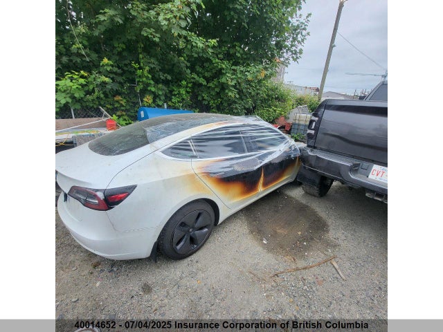 5YJ3E1EAXKF401310 Tesla 2019