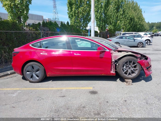 5YJ3E1EA4JF029011 Tesla 2018