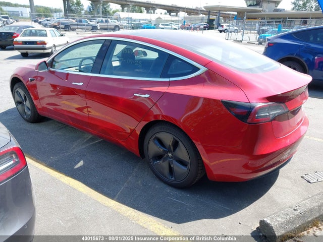 5YJ3E1EA4JF029011 Tesla 2018