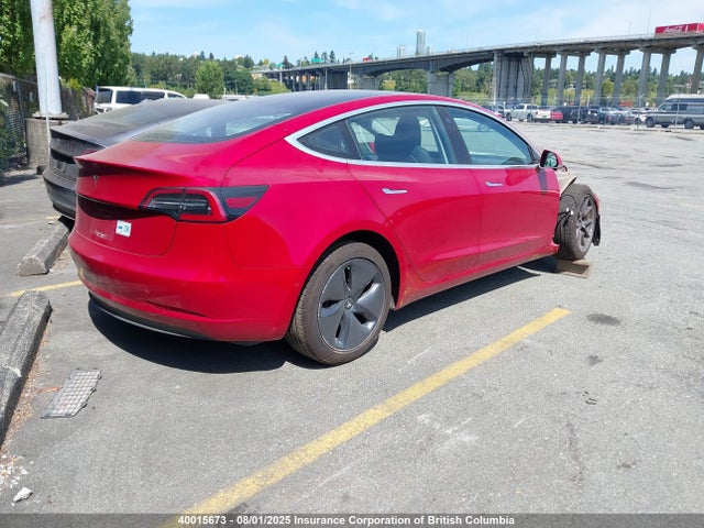5YJ3E1EA4JF029011 Tesla 2018