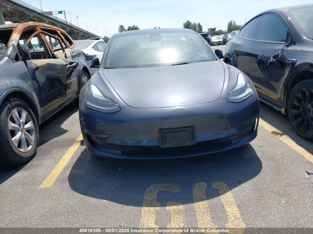 5YJ3E1EA0MF093602 Tesla 2021