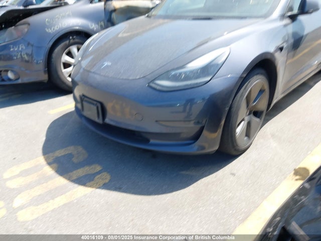 5YJ3E1EA0MF093602 Tesla 2021