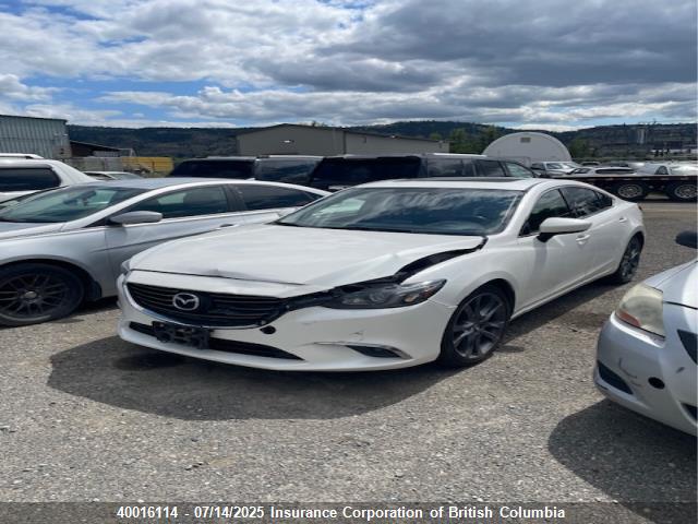 JM1GJ1W57G1411579 Mazda py