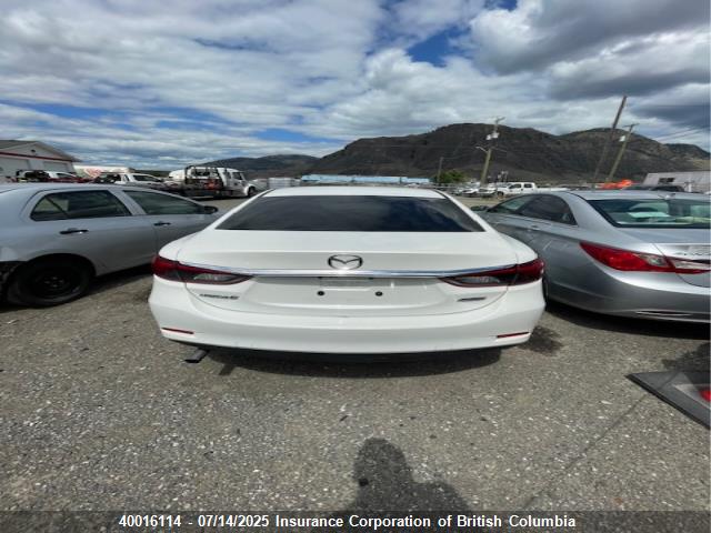 JM1GJ1W57G1411579 Mazda py