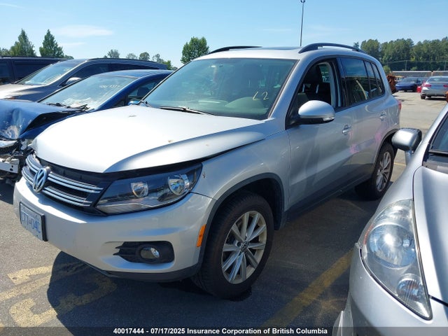 WVGJV3AXXEW619580 Volkswagen Tiguan