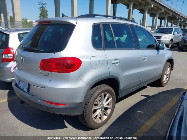 WVGJV3AXXEW619580 Volkswagen Tiguan