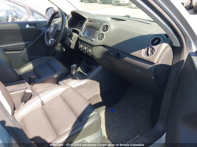 WVGJV3AXXEW619580 Volkswagen Tiguan