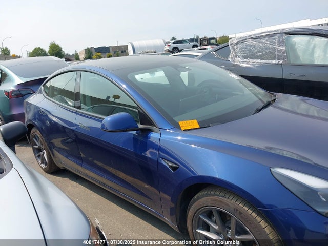 5YJ3E1EA2NF253044 Tesla 2022