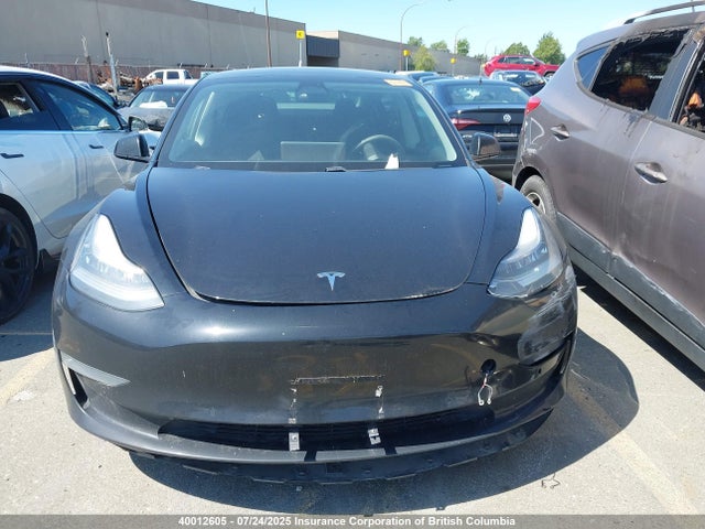 5YJ3E1EA0MF848408 Tesla 2021