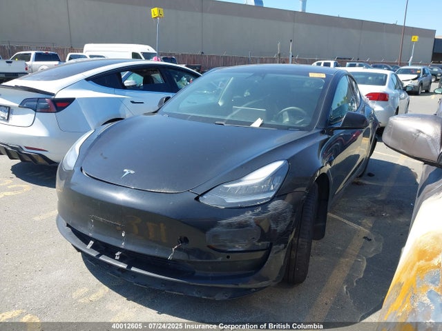 5YJ3E1EA0MF848408 Tesla 2021