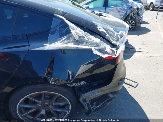 5YJ3E1EA0MF848408 Tesla 2021