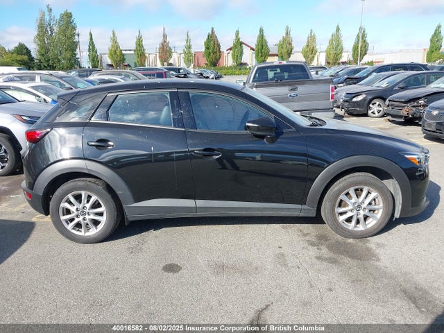 Mazda pe 2022 JM1DKFC73N1605381 Image 13