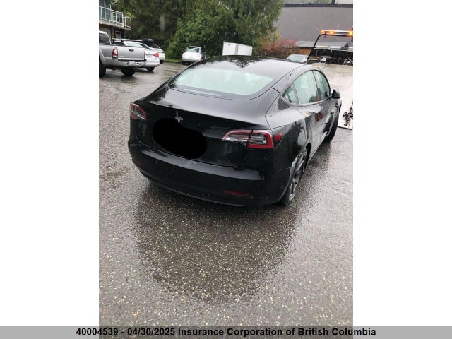 5YJ3E1EA0MF088027 Tesla 2021