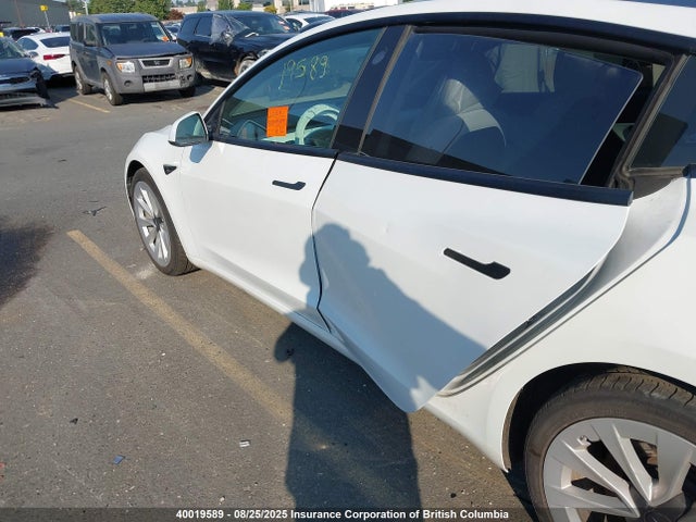 5YJ3E1EA3MF929385 Tesla 2021