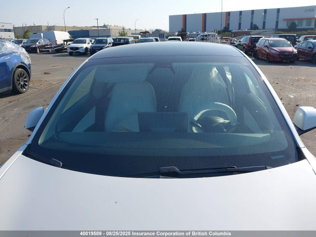 5YJ3E1EA3MF929385 Tesla 2021